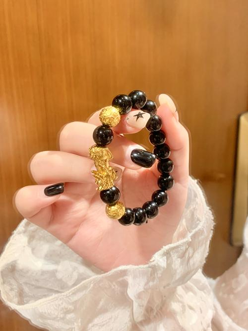 石榴木命佩戴什么旺財必斜  黑曜石驅(qū)邪除祟